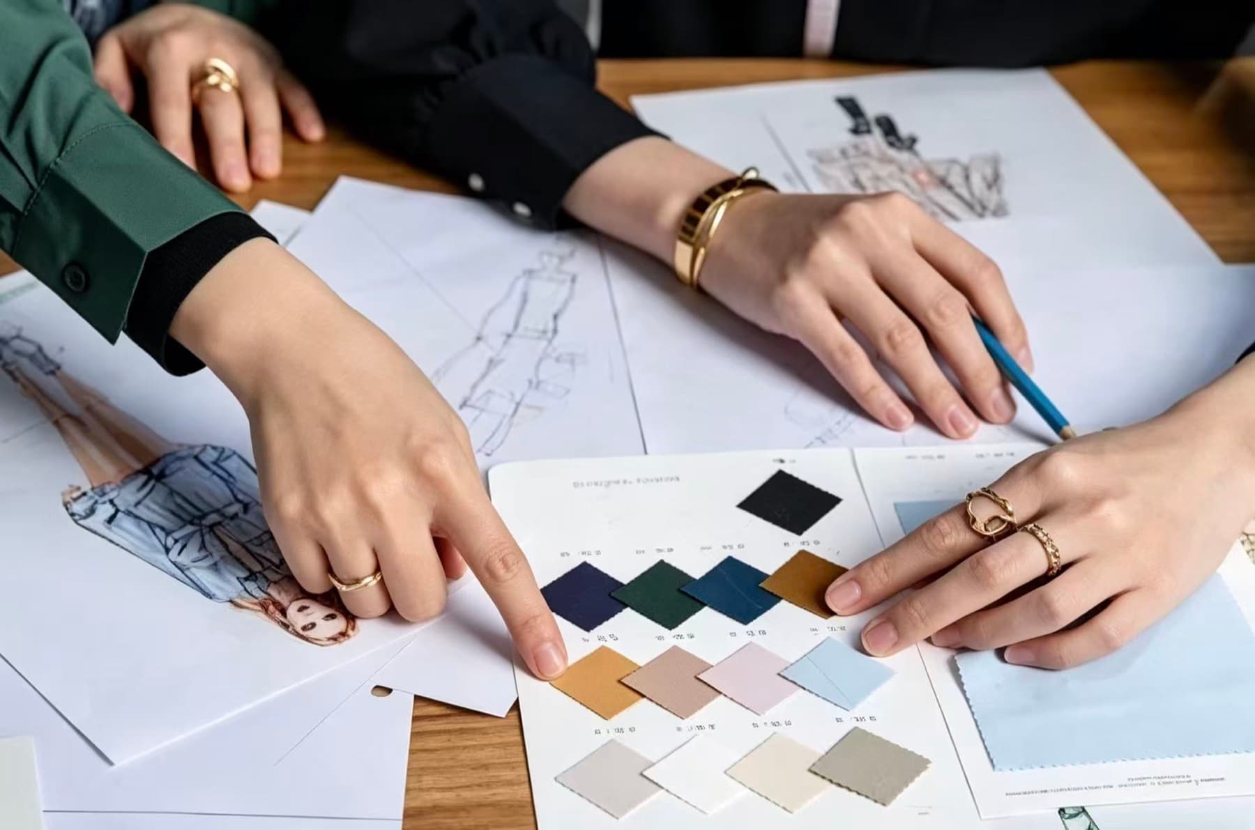 Fabric swatches and product-development references reviewed before activewear sampling