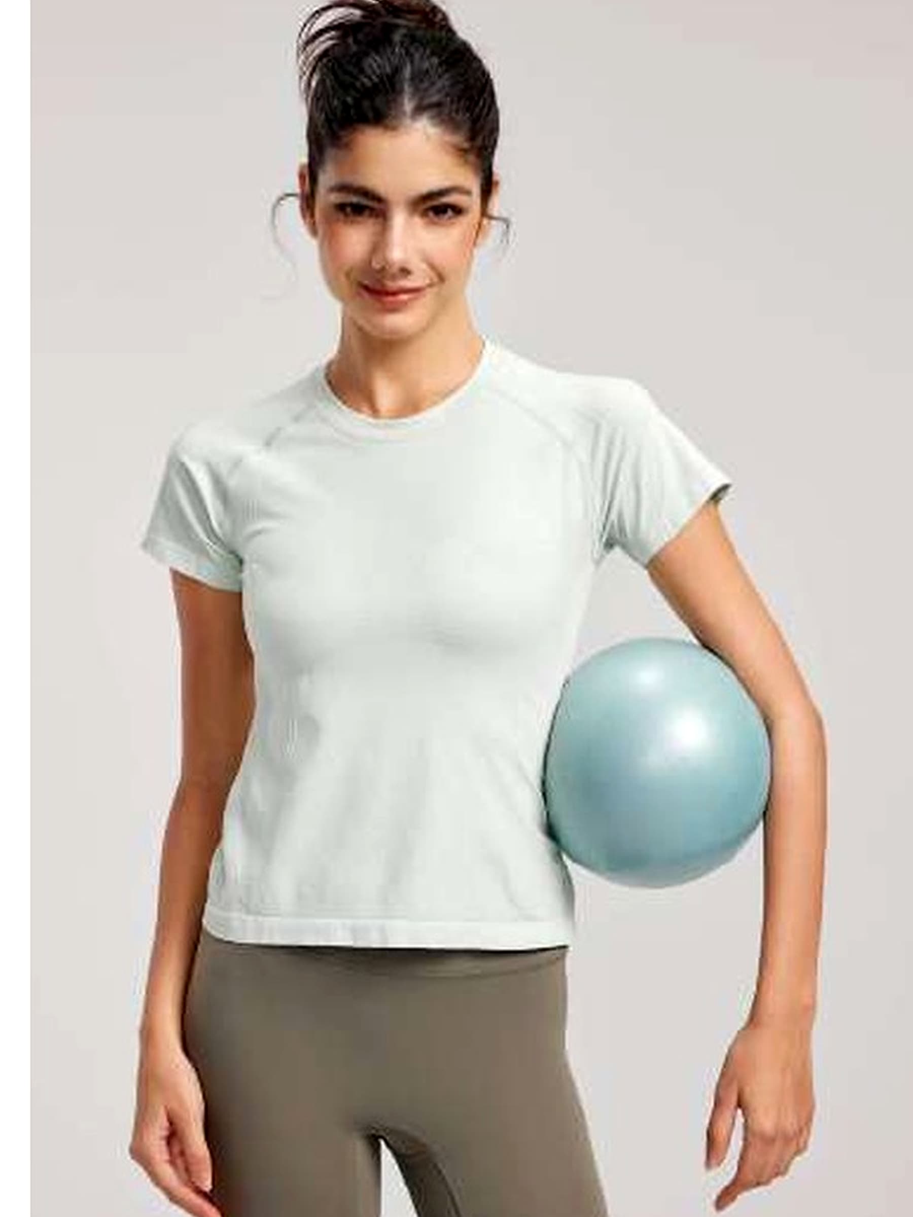 Unbranded short-sleeve activewear T-shirt shown on a model for shoulder, sleeve, chest, body-length and logo-placement discussion