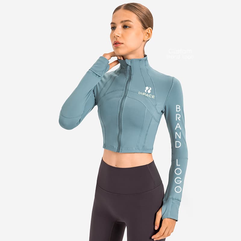 Grey cropped zip-front training jacket with stand collar and shaped panel seams view 4