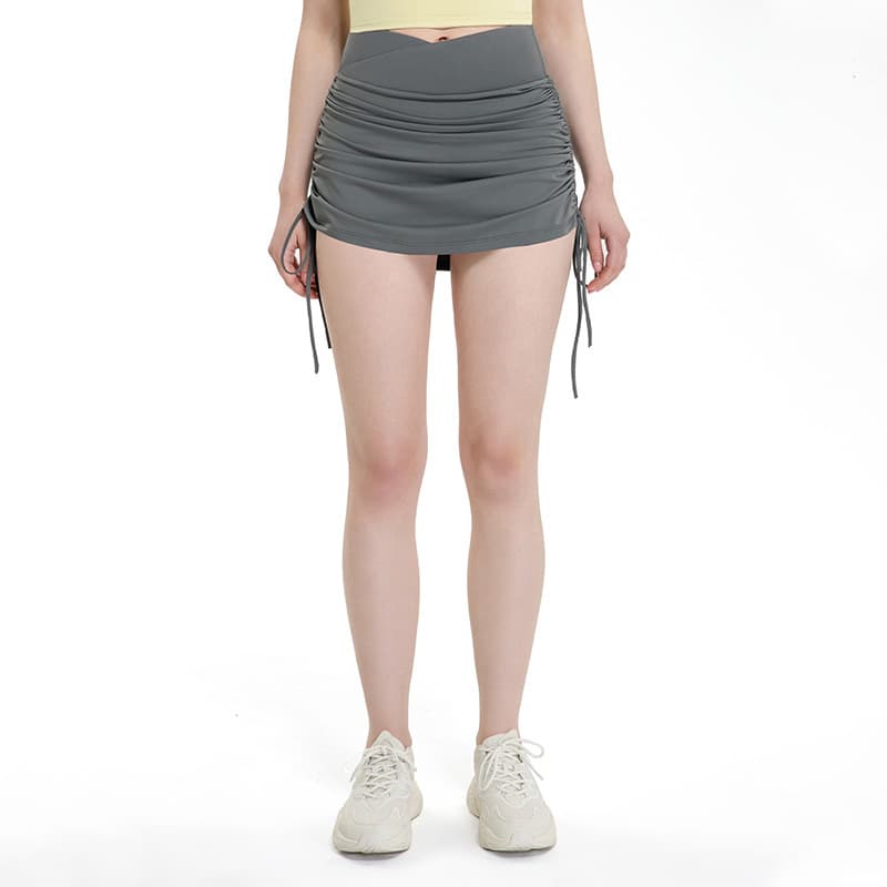 Black ruched side-tie activewear skirt with adjustable drawcord detail view 4