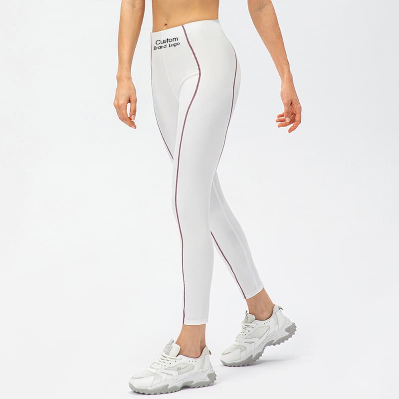 High-waist training leggings with contrast piping along the side leg view 2