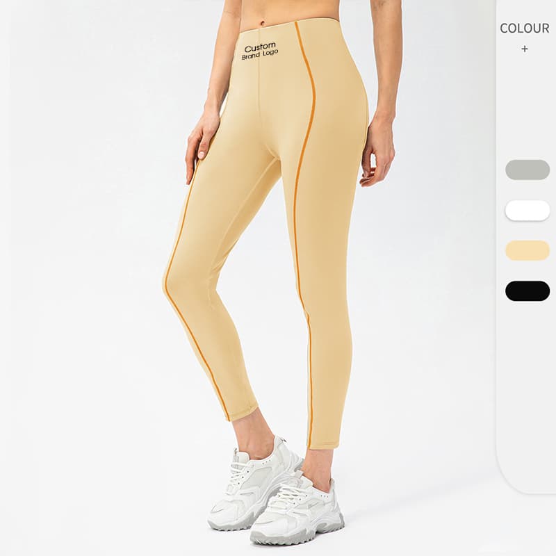 High-waist training leggings with contrast piping along the side leg view 4