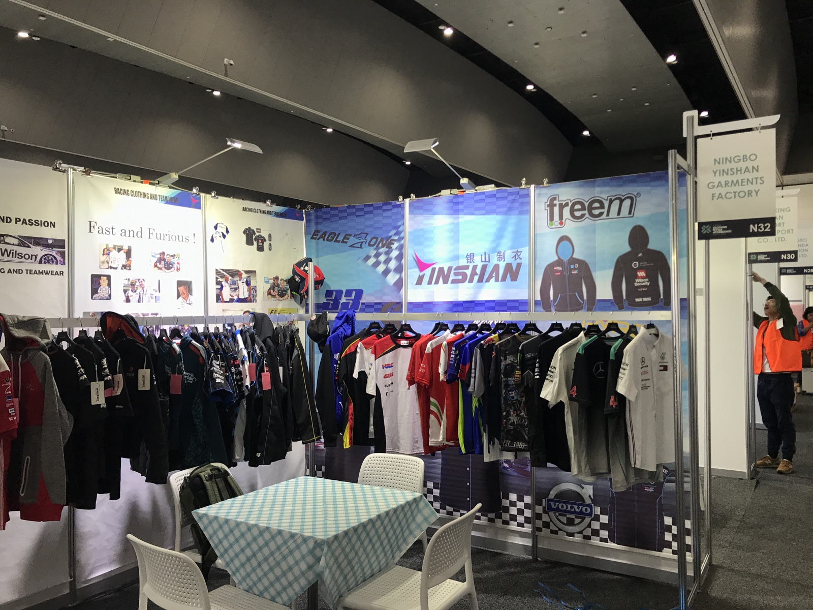 Yinshan Garments Factory trade-fair booth displaying customised sportswear and teamwear