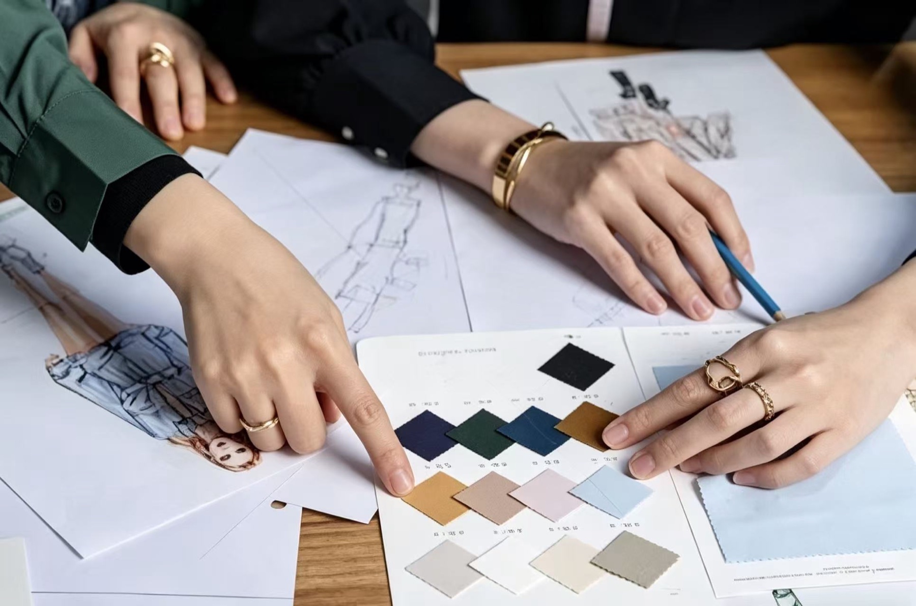 Fabric swatches and product-development references reviewed before activewear sampling