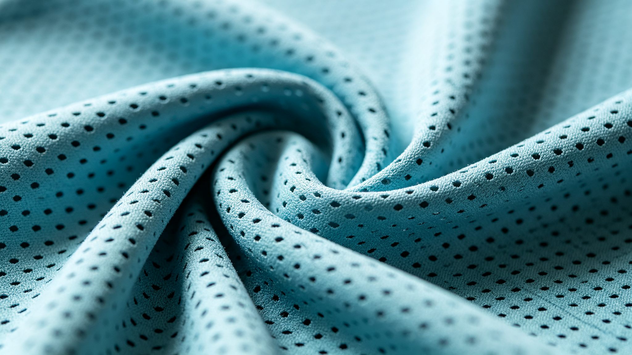섬유 원산지와 별도로 구조를 검토해야 하는 이유를 보여주기 위해 사용된 천공 니트의 클로즈업